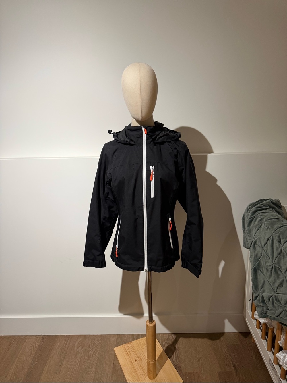 Helly Hansen Black Hooded Raincoat with White Zippers and Orange Pulls